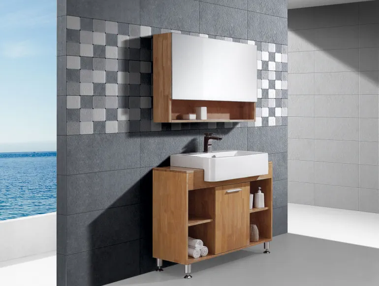 Grey bathroom with sink, cabinets and a window, offering a sleek design